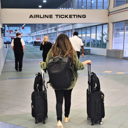 Woman walking with pack go and explore luggage set and travel backpack